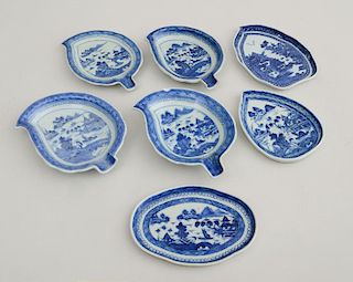 Six Assembled Canton Blue and White Leaf-Form Porcelain Spoon Rests and a Quatrefoil Teapot Stand