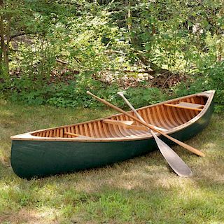Arthur E. Levenseller 12-foot Canoe with Two Canoe Paddles.