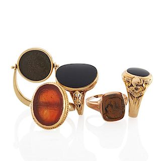 FIVE YELLOW GOLD & HARDSTONE OR COIN MOUNTED RINGS