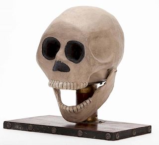 Talking Skull. Columbus: Grant/Reilly, ca. 1942. Papier-mache skull mounted to a hardwood board clicks it jaw to answer questions, once for yes, and t