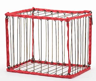 Vanishing Birdcage. Colon: Abbott's, ca. 1950s. Small brass birdcage bound with red ribbon visibly vanishes from the magician's hands. 5 _ x 4 _ x 4 _