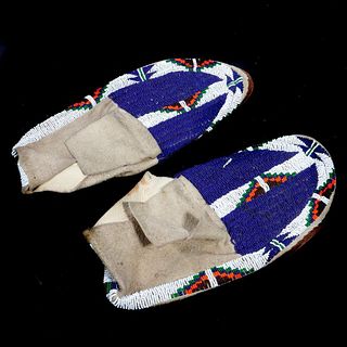 Pair of Native American Blue Beaded Moccasins.