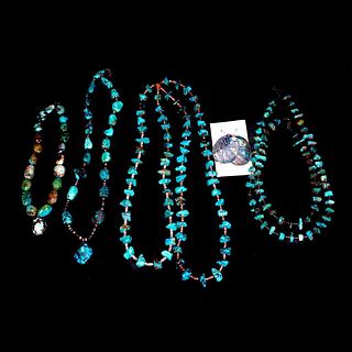 Group of Navajo and Yurok Jewelry.
