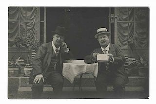 Blind, Adolphe. Trick Photography Postcard. Circa 1920s. Real-photo postcard (RPPC) portraying the magician-author seated at a cafŽ table with a twin