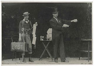 Cardini (Richard Valentine Pitchford). Candid Performance Snapshot. N.p., ca. 1920s. Young Cardini is shown beside a clown, various props, tables, and