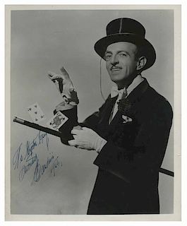 Cardini (Richard Valentine Pitchford). Inscribed and Signed Portrait Photograph. N.p., (1955). Silver gelatin half-length portrait of the Suave Deceiv