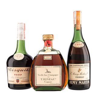 Lote de Cognac. a) Hine. b) Rémy Martin. c) Bisquit. En presentaciones de 700 ml. Total de piezas: 3.