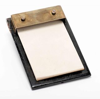 Menta-Pad. [London]: Davenport's Magic, ca. 1955. Palm-sized painted iron and brass pad, with original unused paper sheets, for various effects of men