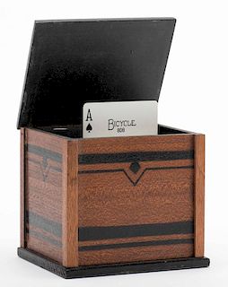 Rising Card Chest. [London]: [Davenport's Magic], ca. 1960. Wooden chest, painted black, with internal houlette that causes the chosen card to rise wi