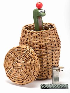 Snake Basket. England: Jack Hughes, ca. 1970. A woven basket contains a ÒliveÓ snake who, after considerable comedic by-play (he rises from the bask