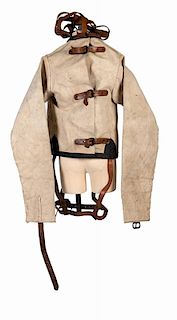 Vintage Strait Jacket. American, fourth quarter twentieth century. Heavy strait jacket with canvas/burlap body, leather straps and belts for arms, leg