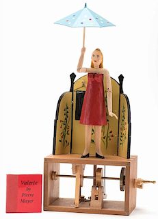Valerie Costume Change Automaton. Paris: Pierre Mayer, ca. 2004. Handmade wooden automaton with exposed works. When the crank is turned, the magician 