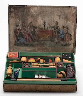 Early French Magic Set. Circa 1890. Handsome beginner's magic set includes a Bonus Genius, three tin cups, small ball vase (ball lacking), lacquered b