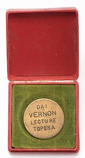 Vernon, Dai. Dai Vernon Topeka Lecture Token. Engraved brass token bears the words ÒDai Vernon Lecture TopekaÓ on the obverse; plain reverse. 1 1/8