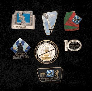 [Badges and Pins] Collection of Seven Vintage Magic Convention Pins. German, 1950s Ð 70s. Including five color enameled brass examples from various 1