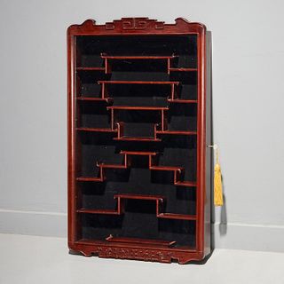 Chinese carved hardwood wall cabinet