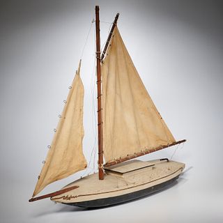 Antique carved and painted pond sailboat