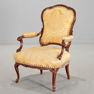 Italian Rococo carved walnut arm chair
