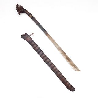 Southeast Asian short sword, carved figural handle