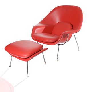A SAARINEN RED 'WOMB CHAIR' AND FOOTSTOOL, DESIGNED BY EERO SAARINEN (FINISH-AMERICAN 1910-1961), FOR KNOLL, DESIGNED 1948