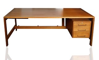A MID-CENTURY WOODEN WRITING DESK