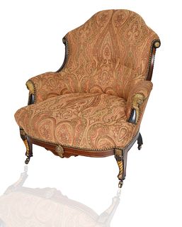 A POTTIER AND STYMUS STYLE UPHOLSTERED ARMCHAIR