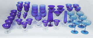 A GROUP OF FORTY-TWO VINTAGE COBALT AND LIGHT BLUE HAND BLOWN ARTISANAL GLASS STEMWARE