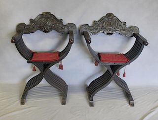 Pair of Carved Antique Savonarola Chairs.