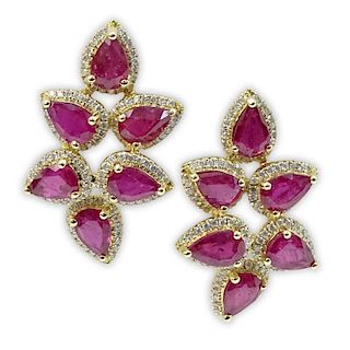 Pair of Approx. 5.12 Carat Pear Shape Ruby and 18 Karat Yellow Gold Earrings