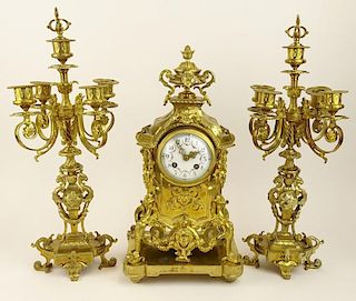 Antique Three (3) piece French ormolu bronze clock garniture set.