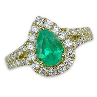 1.37 Carat Pear Shape Emerald, .80 Carat Round Brilliant Cut Diamond and 18 Karat Yellow Gold Ring