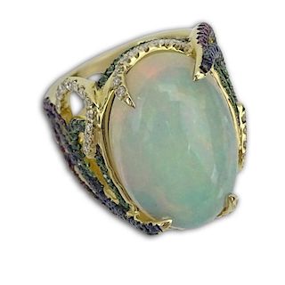 Approx. 11.31 Carat White Opal and 14 Karat Yellow Gold Ring accented throughout with Round Cut Diamonds