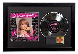 A Lindsey Lohan: Speak RIAA Certified Platinum Presentation Album 20 1/2 x 30 3/4 inches.