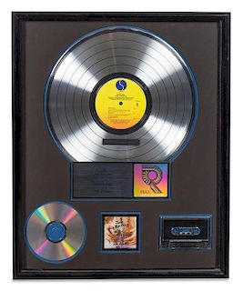 A Madonna: Like a Prayer RIAA Certified Platinum Presentation Album 21 x 17 inches.