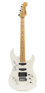 A Jon Bon Jovi & Richie Sambora Autographed Guitar Length 38 1/2 inches.
