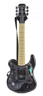 An Enuff Z'Nuff Autographed Toy Guitar Length 21 1/2 inches.