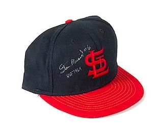 A Stan Musial Autographed Baseball Hat Height of display case 6 1/2 x width 9 x depth 10 1/2 inches.