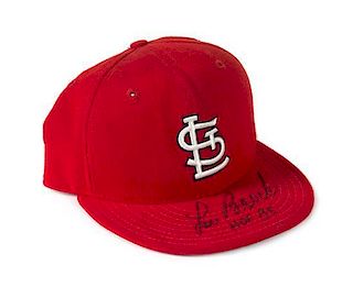 A Lou Brock Autographed Baseball Hat Height of display case 6 1/2 x width 10 1/2 x depth 9 1/2 inches.