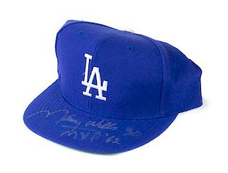 A Maury Wills Autographed Baseball Hat Height of display case 8 x width 9 1/2 x depth 10 inches.