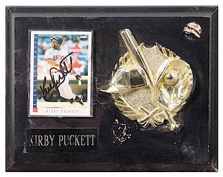 A Kirby Puckett Autographed Baseball Card Card 3 1/2 x 2 1/2 inches.