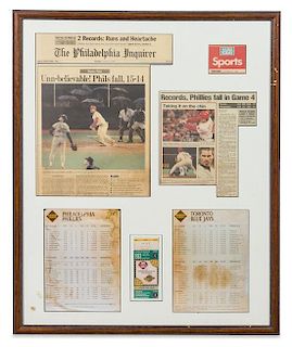 A 1993 World Series Framed Newspaper, Lineup Card and Ticket Stub 31 1/2 25 1/2 inches overall.
