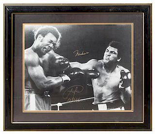 A Muhammad Ali & George Foreman Autographed Photo 23 x 27 inches overall.