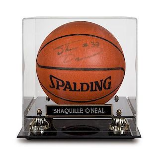 A Shaquille O'Neal Autographed Basketball height of display case 12 x width 11 x depth 12 inches.