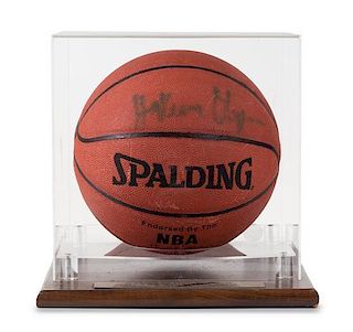 A Hakeem Olajuwon Autographed Basketball Height of display case 12 x width 11 1/2 x depth 12 inches.
