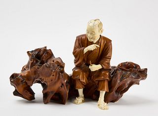 Wood and Bone Sculpture of Man Whittling