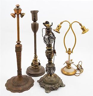 * An Assembled Group of Four Table Lamp Bases Height of tallest 23 1/2 inches.