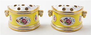 A Pair of Parcel Gilt and Polychrome Porcelain Wall Pockets Width 8 1/2 inches.