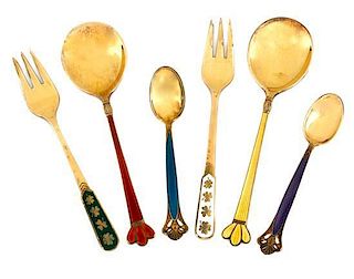* A Collection of Danish Enameled Gilt Metal Forks and Spoons Length 5 1/4 inches.
