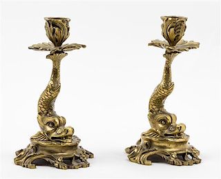 * A Pair of Gilt Metal Figural Candlesticks Height 7 inches.