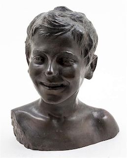 * A Bronze Bust of a Smiling Boy. Height 12 1/2 inches.